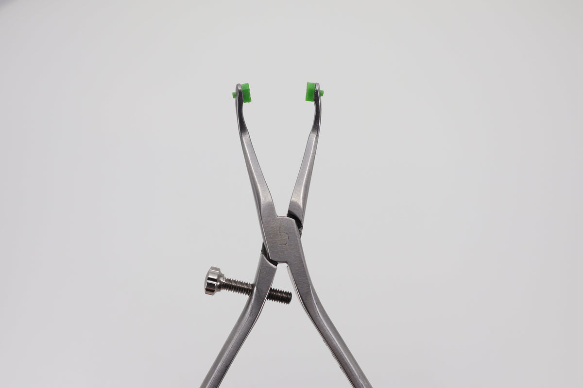 Crown-Tractor Exclusive crown remover pliers 19.274.15, front view with polymer jaws
