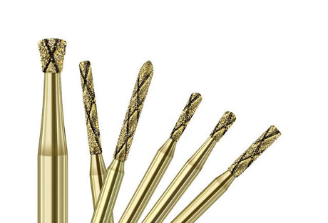 Dental Bur ISO Numbering Explained with gold diamond dental burs in various shapes and sizes
