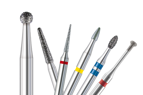 Busch Bur Ring Colors Explained with dental burs showing red, yellow, and blue grit rings