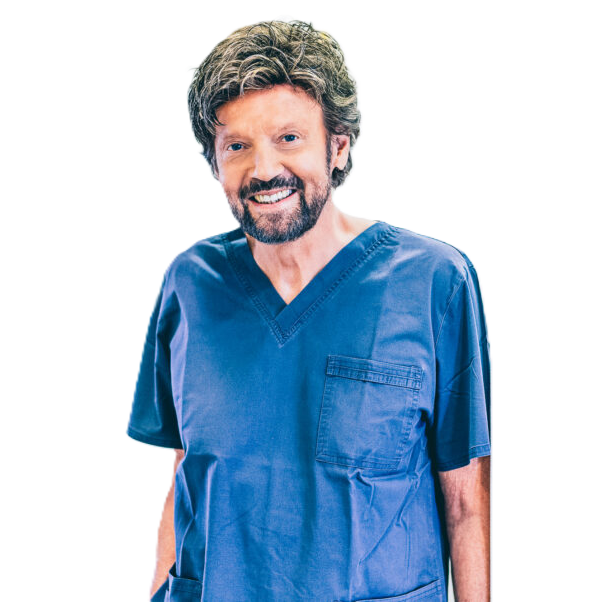 Dr. Bernhard Giesenhagen Instrument collection creator smiling in blue scrubs, implantology expert