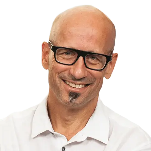 Dr. Markus Hürzeler smiling portrait – globally recognized specialist in periodontics and implant dentistry