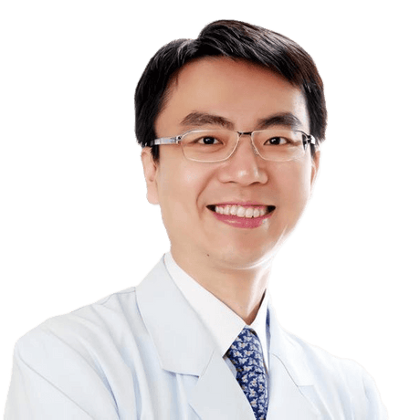 Dr. Shih-Cheng Wen Instrument collection creator, smiling dentist in white coat and glasses