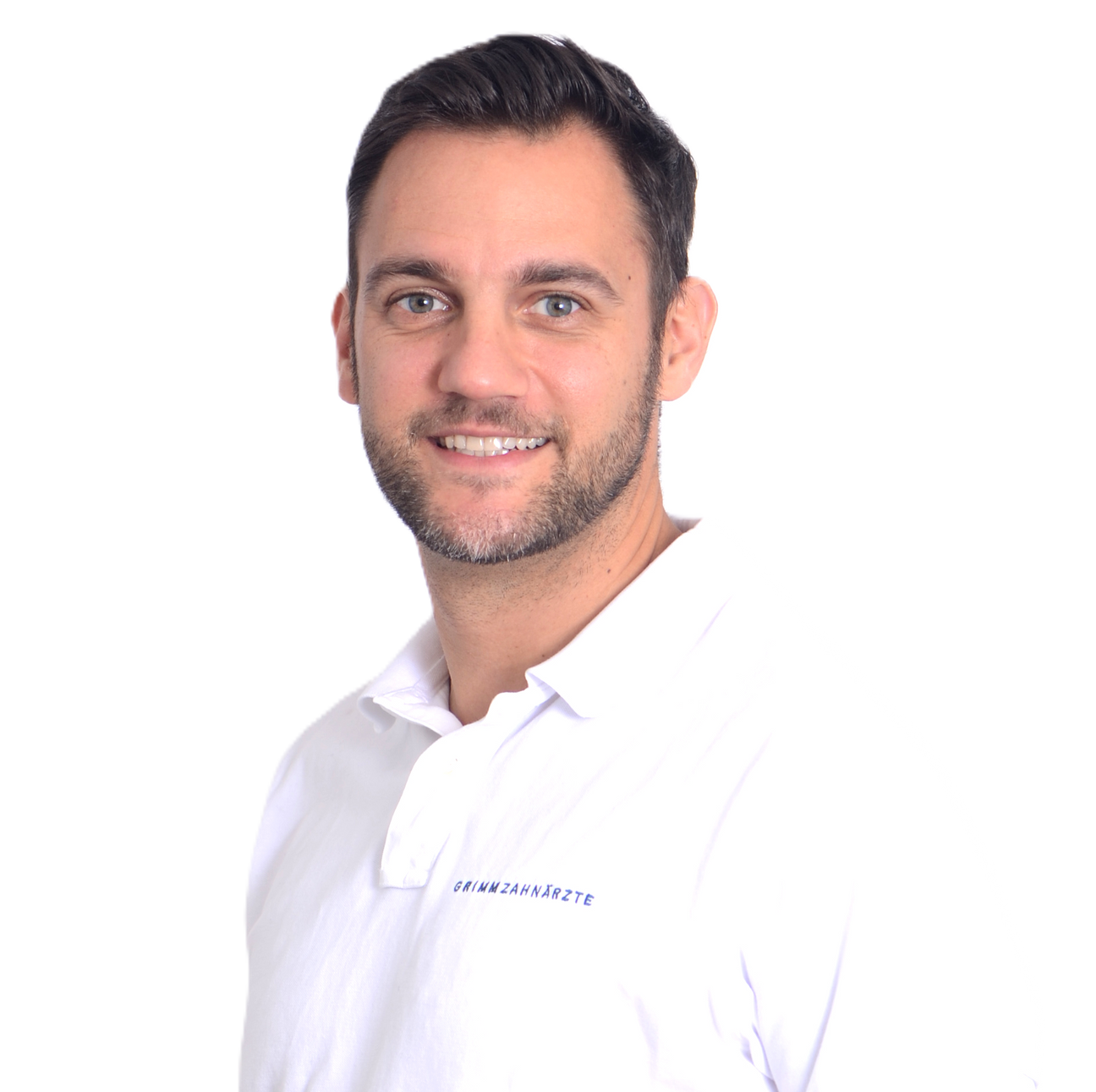 Dr. Marco Zeltner Instrument Collection - Professional Portrait of Dr. Marco Zeltner in White Medical Polo Shirt