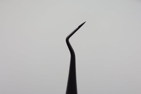 Close-up of angled root tip elevator, designed for precision retrieval of root tips and fragments.