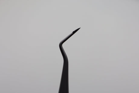 Root tip elevator featuring a finely curved tip for precision retrieval of root tips and fragments.