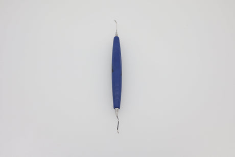 M23 universal curette 24.207.23 slim version with cobalt-blue bIONIK QuickFix handle, upright view