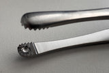 Close-up of the Russian forceps jaw: radially serrated cup with central boss, Helmut Zepf 22.610.15